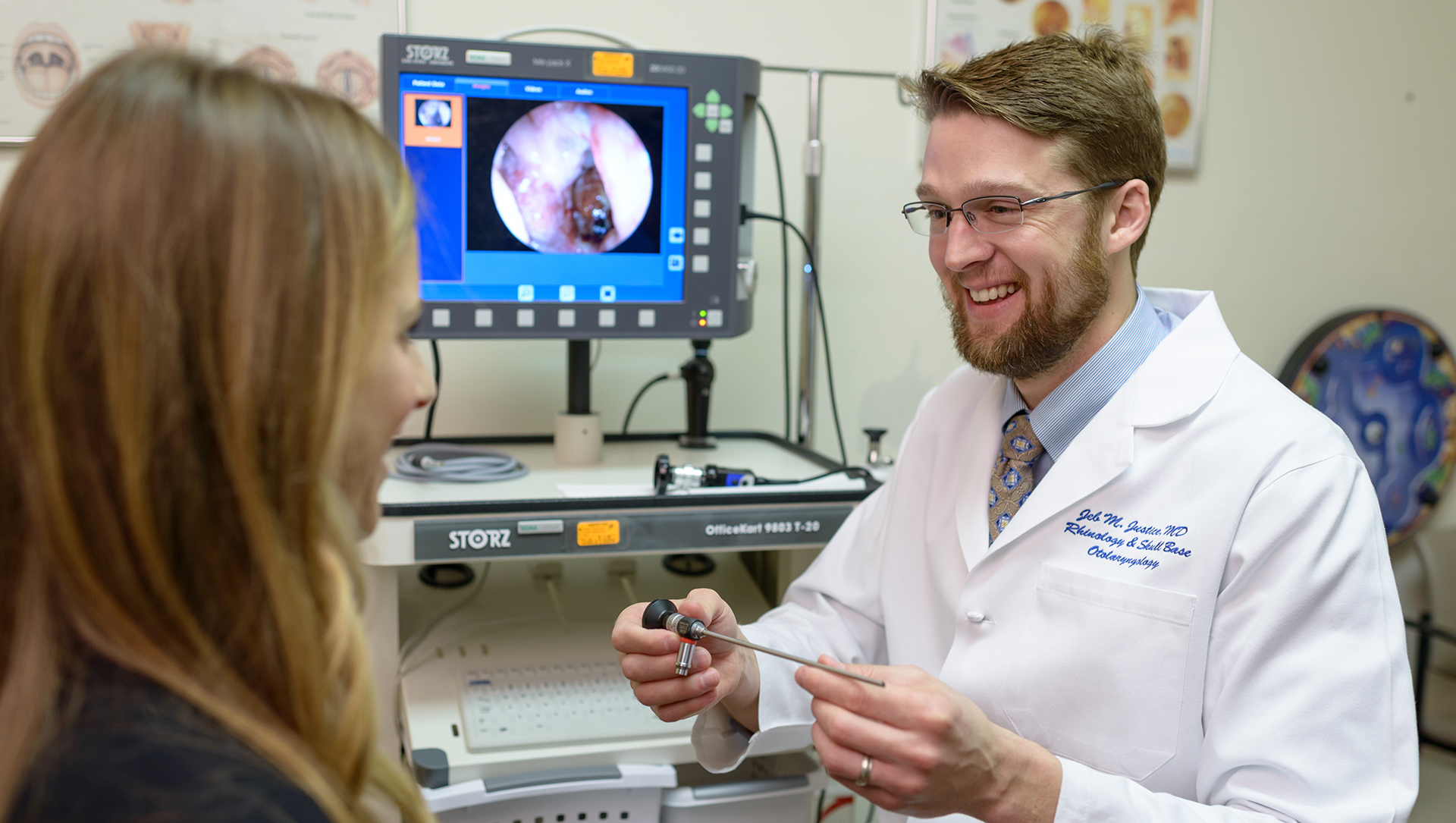 Jeb Justice, MD, with patient.